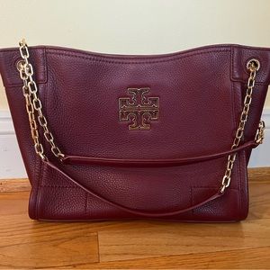 Tory Burch bag, near new condition, wine-colored, adjustable strap